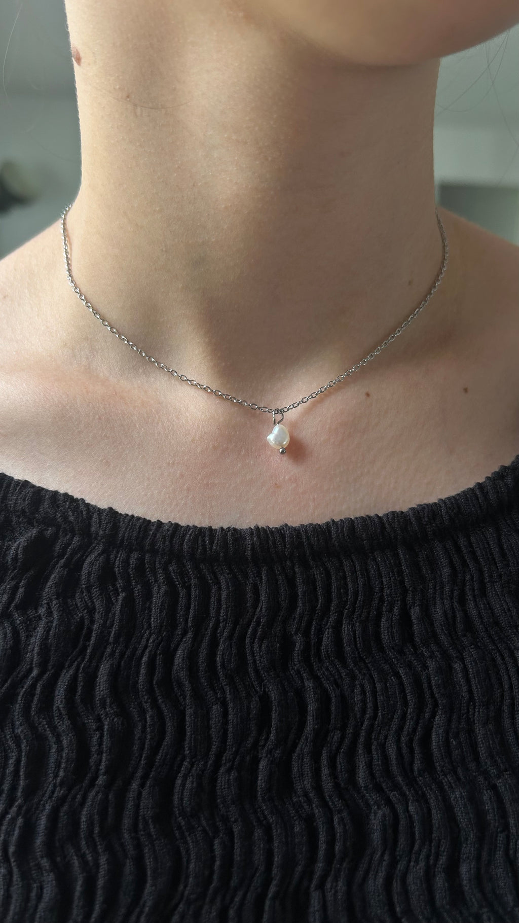 Collier dos nu