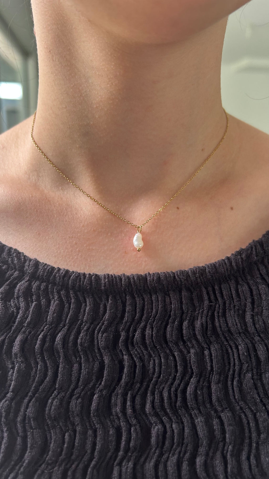 Collier dos nu